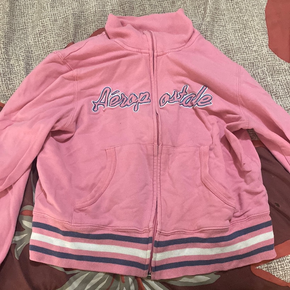 aero pastel pink sweater.